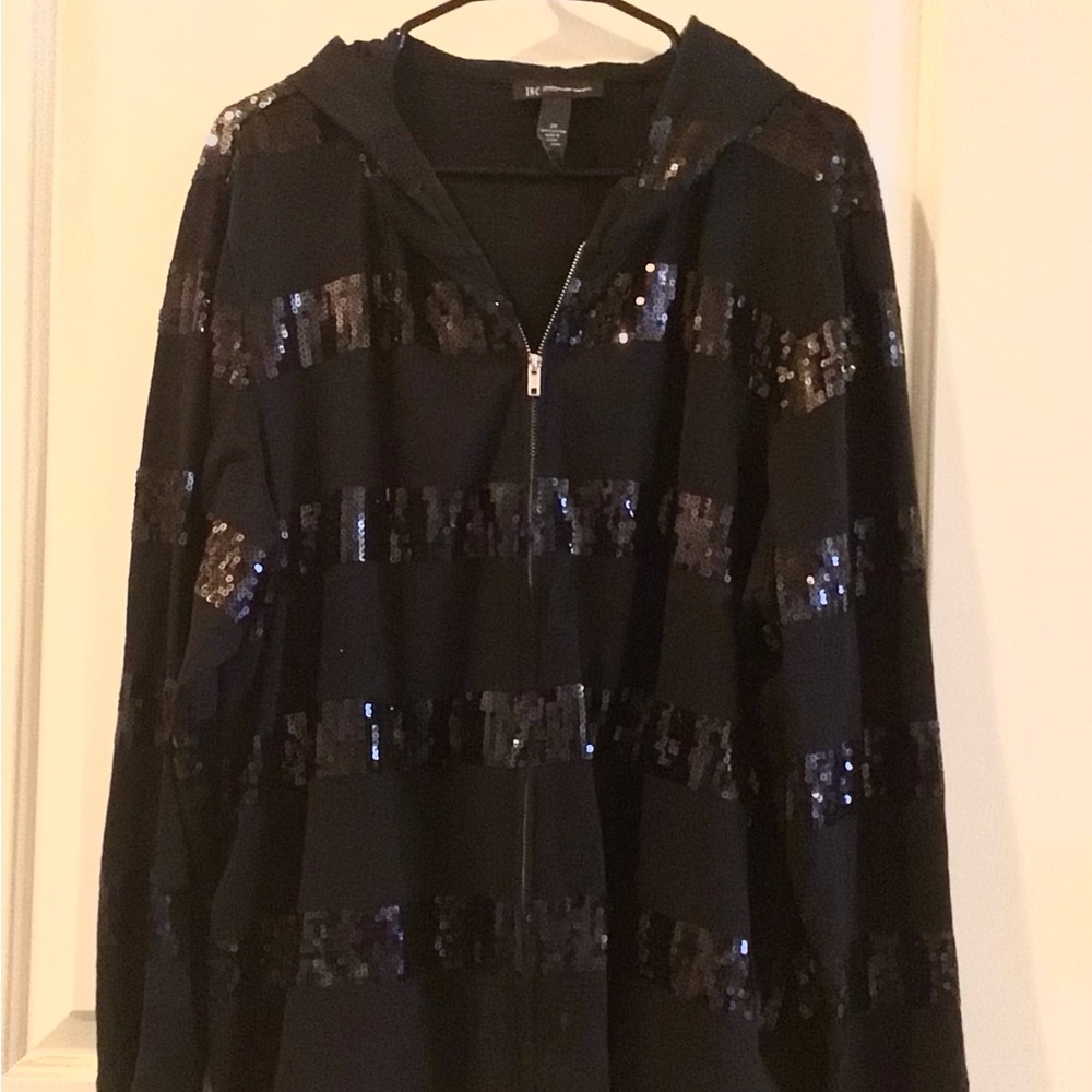 This is beautiful.  Black jacket. Sparkles size 2x long sleeve with hood